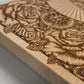 video of Dia de los Muertos altar table engraved on solid beech wood with floral and Holy Death sun moon motifs