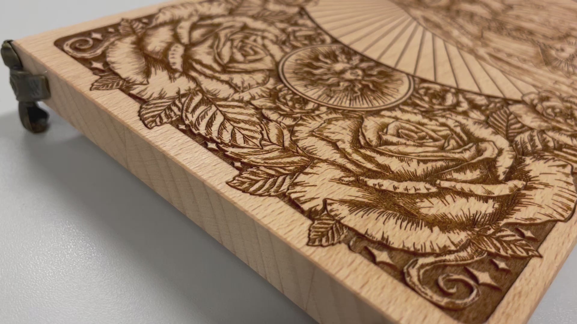 video of Dia de los Muertos altar table engraved on solid beech wood with floral and Holy Death sun moon motifs