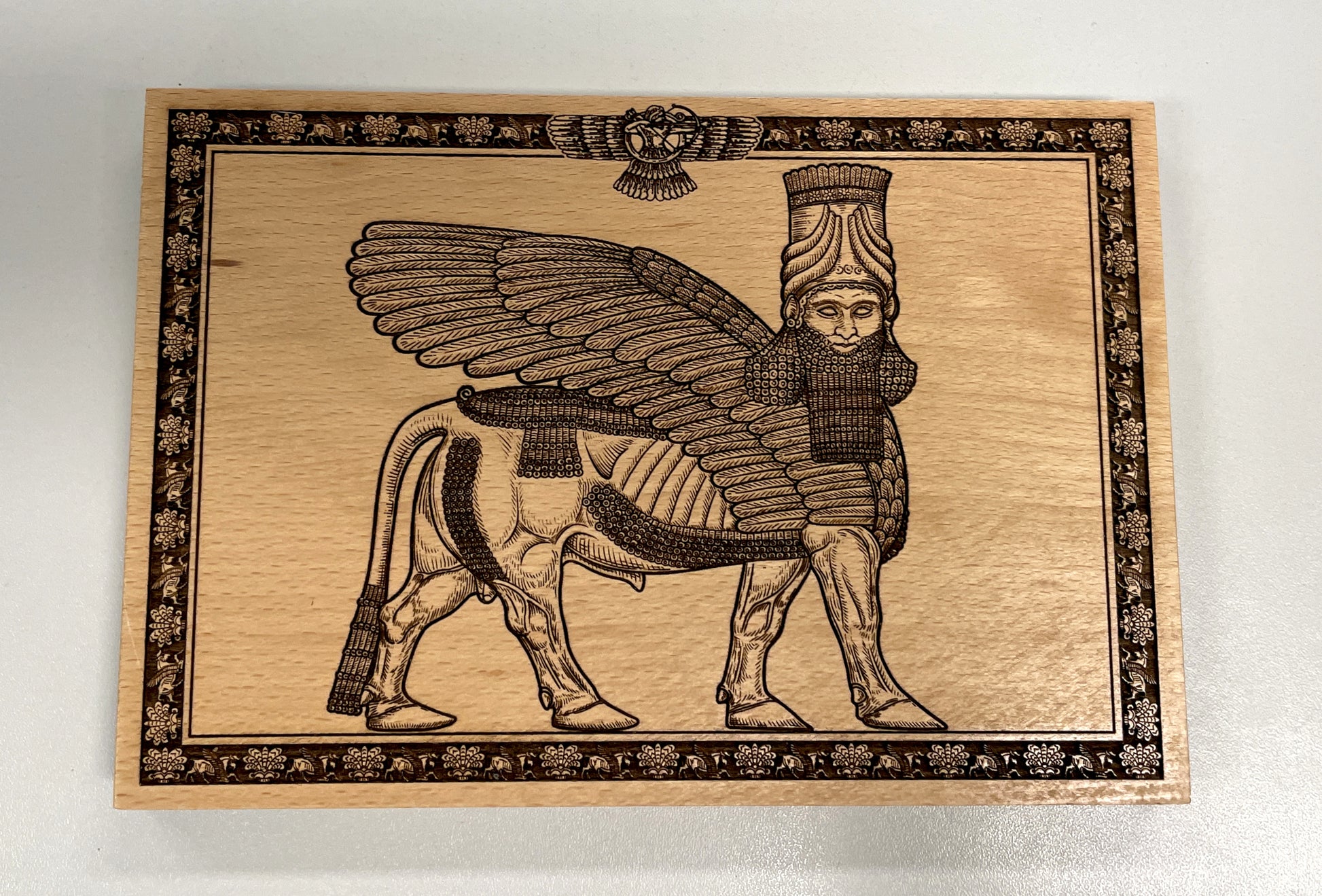 video of Anunnaki Lamassu wall art engraved in solid beech wood ancient Assyrian winged guardian