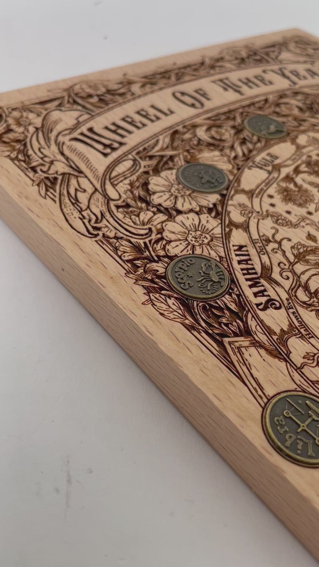 Video of Wiccan Wheel of the Year wall art with seasonal pagan symbols
