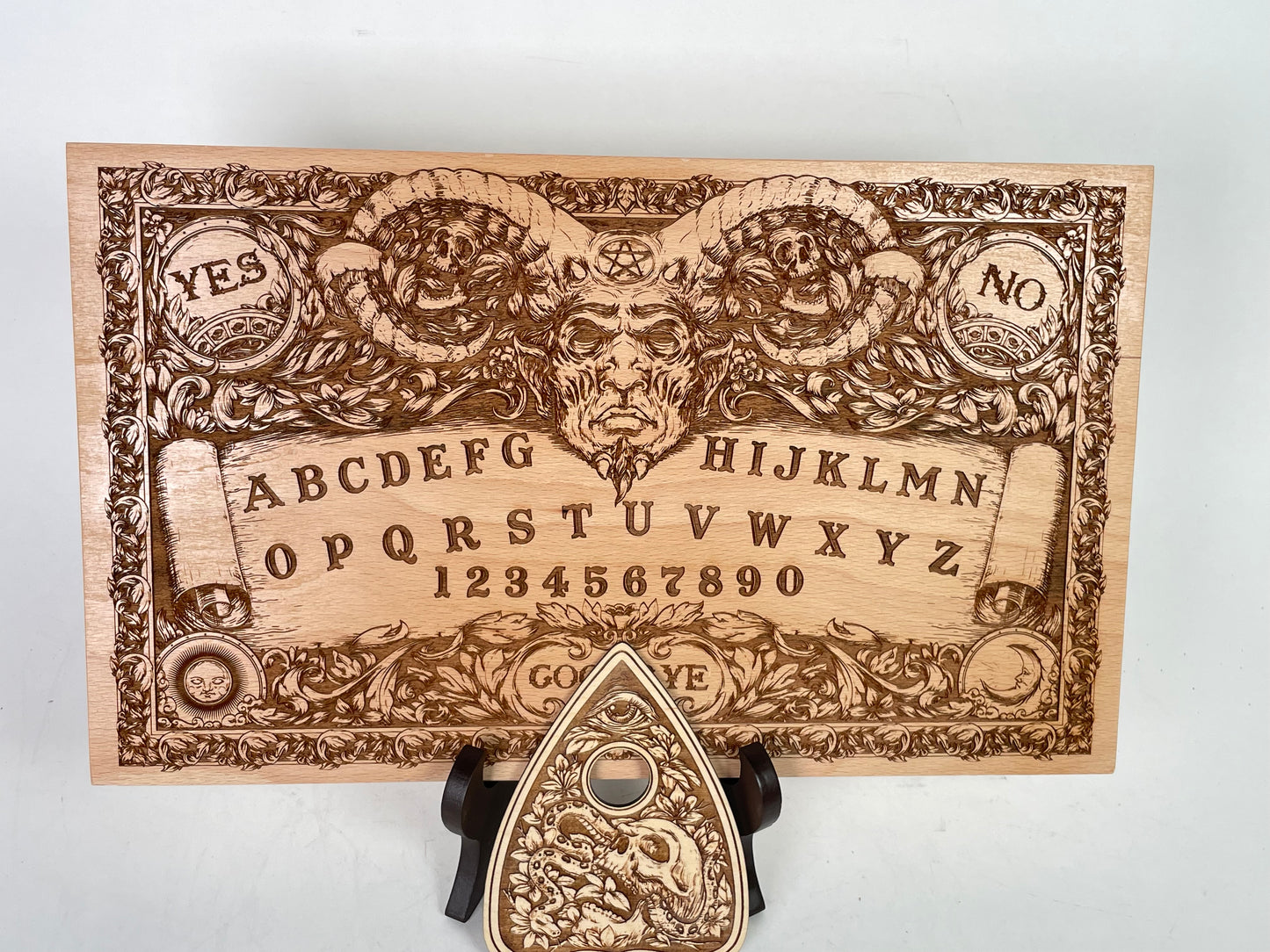 Gothic spirit board engraved with Baphomet symbol and classic Ouija markings, solid wood construction suitable for ritual practice, satanic altar use, and dark fantasy home decor
