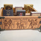 Solid wood tarot and oracle deck holder showing multiple decks stored in 12 slots
