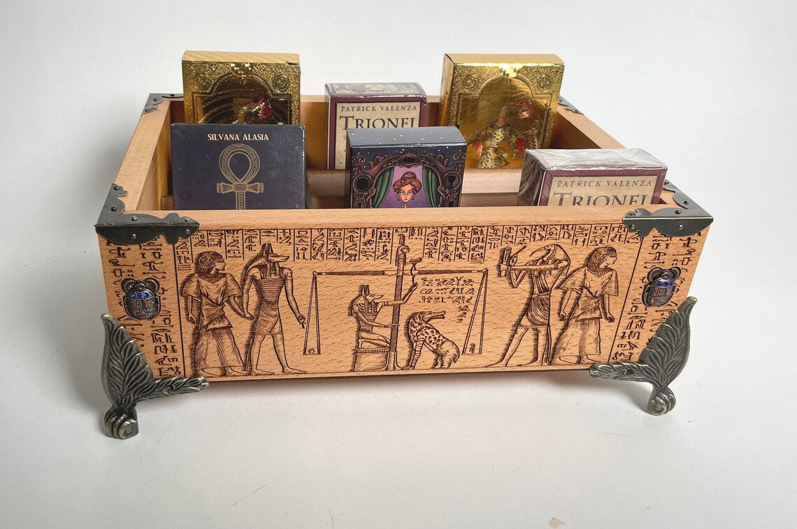 Solid wood tarot and oracle deck holder showing multiple decks stored in 12 slots

