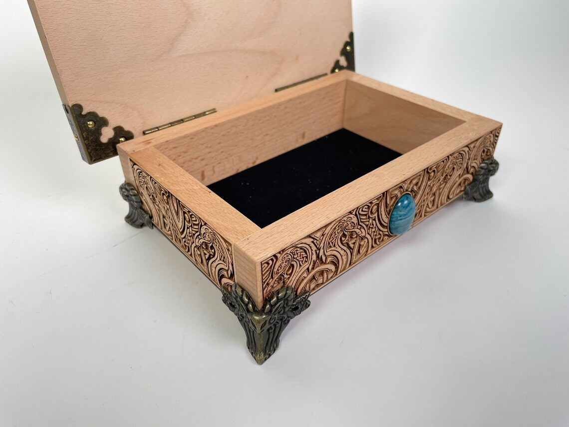 Open solid wood tarot box used on Viking altar for crystals ,sacred items and divination.
