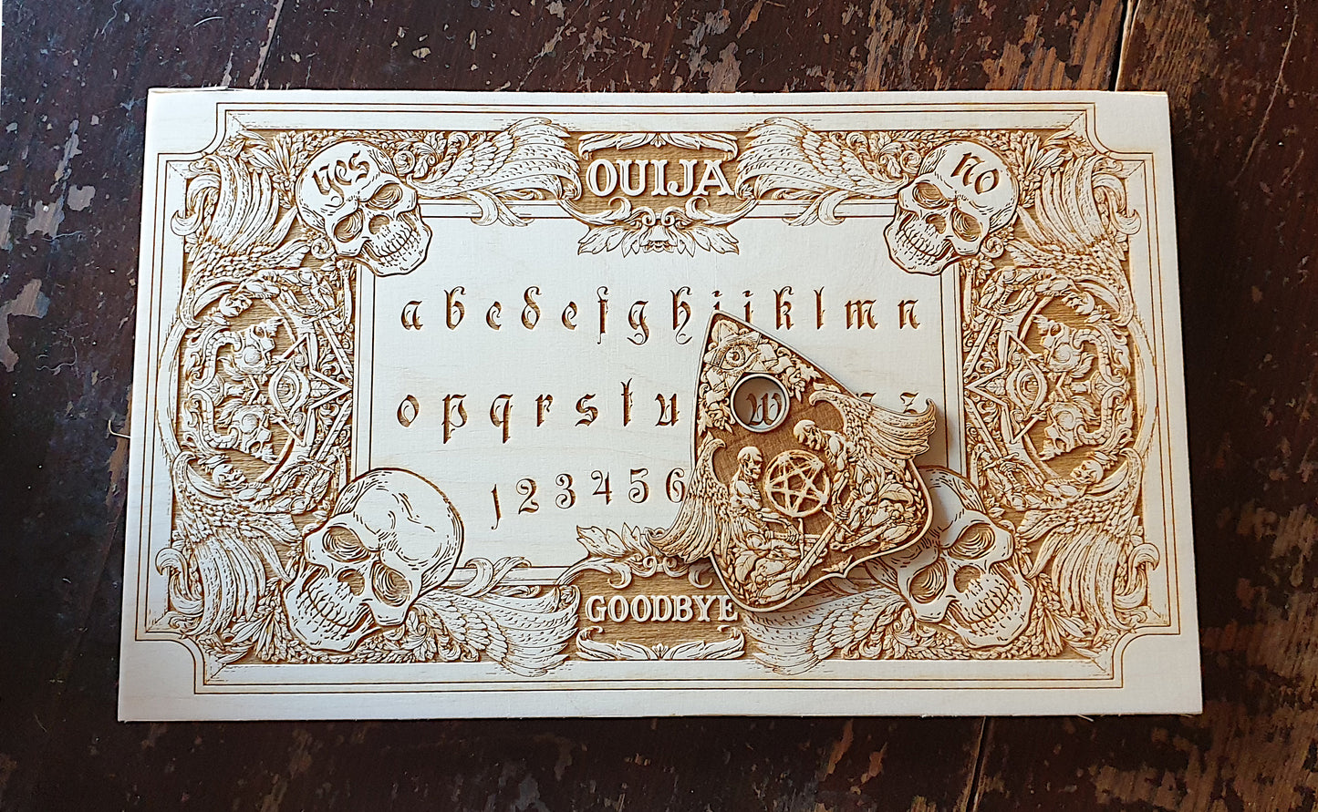 Ouija board with demons and skulls wooden engraving, wood gothic skull spirit board. 